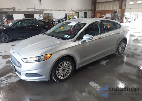 2013 Ford Fusion Hybrid Se z USA, uszkodzony, nr VIN 3FA6P0LUXDR115933